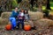 Mom and family in pumpkin patch