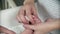 Mom Hands Foot Massage Her Newborn Baby