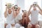 Mom with her daughters making clay face mask