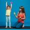 Mom and her little daughter perform fitness exercises with dumbbells, concept, lifestyle