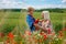 Mom with her son in a magnificent meadow.