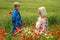 Mom with her son in a magnificent meadow.