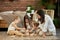 Mom and kids play squirl jenga tower. Woman girl and boy play family puzzle game. Family day off.