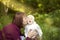 Mom kisses happy baby