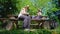 Mom and little daughter have break with snack on wooden bench during hike in nature