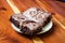 Mom`s homemade gooey chocolate brownies with vanilla chocolate frosting swirl