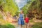 Mom and son tourists on the Fairy stream among the red dunes, Muine, Vietnam. Vietnam opens borders after quarantine