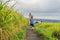 Mom and son travelers on Beautiful Jatiluwih Rice Terraces against the background of famous volcanoes in Bali, Indonesia