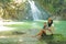 Mom and son on Wafsarak Waterfall on Biak Island