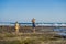 Mom and son are walking along the cosmic Bali beach.. Portrait travel tourists - mom with kids. Positive human emotions