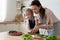 Mom teach little daughter cooking in kitchen