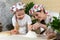 Mom tells and shows her daughter how delicate the flour is after it is sifted through a sieve. Kitchen experiences with