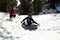 A Mom and Toddler Sledding