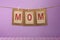 Mom word shape hanging with clothespin