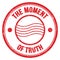 THE MOMENT OF TRUTH text on red round postal stamp sign