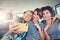 These are the moments we cherish the most. young women taking a selfie while out on a road trip together.