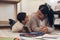 With Moms love, I can learn anything. an adorable little boy using a smartphone while completing a school assignment