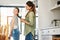 Moms make the best hairdressers. a happy mother braiding her daughters hair at home.