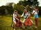 Moms the master musician and we follow her lead. a beautiful mother playing instruments with her adorable daughters