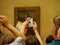 Mona Lisa in modern times, through the iPhone at the Louvre