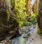The Monachil river flows exits a tunnel into a gorge in the Sierra Nevada mountains, Spain