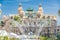 Monaco, Monte-Carlo, 02 October 2019: The Casino Monte Carlo through the fountain, facade of building, monument mirror