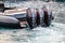 Monaco, Monte-Carlo, 27 September 2019: Three combined powerful motor engines by the rubber boat in operation, black