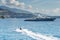 Monaco, Monte-Carlo, most expensive mega yacht on sea, sunny day, Jet Ski, mountains on background