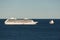 Monaco, vintage sail yacht and huge cruise liner are in sea at sunset, huge motor ship, wealth life of billionaires