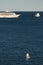 Monaco, vintage sail yacht and huge cruise liner are in sea at sunset, huge motor ship, wealth life of billionaires