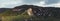 Monasteries hanging over rocks Meteora. Panoramic aerial view of Rousanou Monastery. Greece travel destination. banner