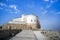 Monastery on the Mount Nebo. Beautiful old on top of mountain on blue sky background. Place of Moses ` death.