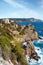 Monastery of Paleokastritsa atop rocks with sea view in Corfu