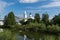 Monastery pond and Holy Gates at background. Spaso-Prilutsky Monastery in Vologda, Russia