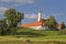 Monastery Reutberg with cows in Bavaria