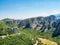 Monastery of Rusan against the background of rock formations  in the mountains in Meteora region, Greece