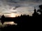 Monastery silhouette, lake, sky, sunset