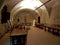 Monastery of St. Michael in Frigolet, France - may 28, 2017: A monk in a white cassock sets the table in the refectory of an ancie