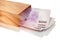 Monetary of banknotes in a package for purchases , paper the package for purchases is filled with banknotes. concept, consumer