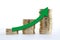 Money as staircase graph with green arrow going up economy on white background. Close up