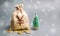 Money bag with coins and snowfall with tree. Business and finance. Loans, deposit, credit. New Year promotions and Christmas.