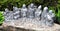 Money coins and Seven lucky gods statues at Daisho-in temple, Miyajima island Japan