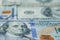 Money colorful background close-up. Details of American national currency banknotes bills. Symbol of wealth and prosperity. Cash,