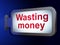 Money concept: Wasting Money on billboard background