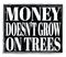 MONEY DOESN`T GROW ON TREES, text on black stamp sign