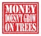 MONEY DOESN`T GROW ON TREES, text written on red stamp sign