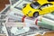 The money euro and dollars and small automobile