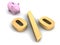 Money piggy coin bank and big golden percent symbol