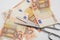 Money scissors cut euro finance