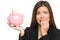 Money stress - business woman holding piggy bank